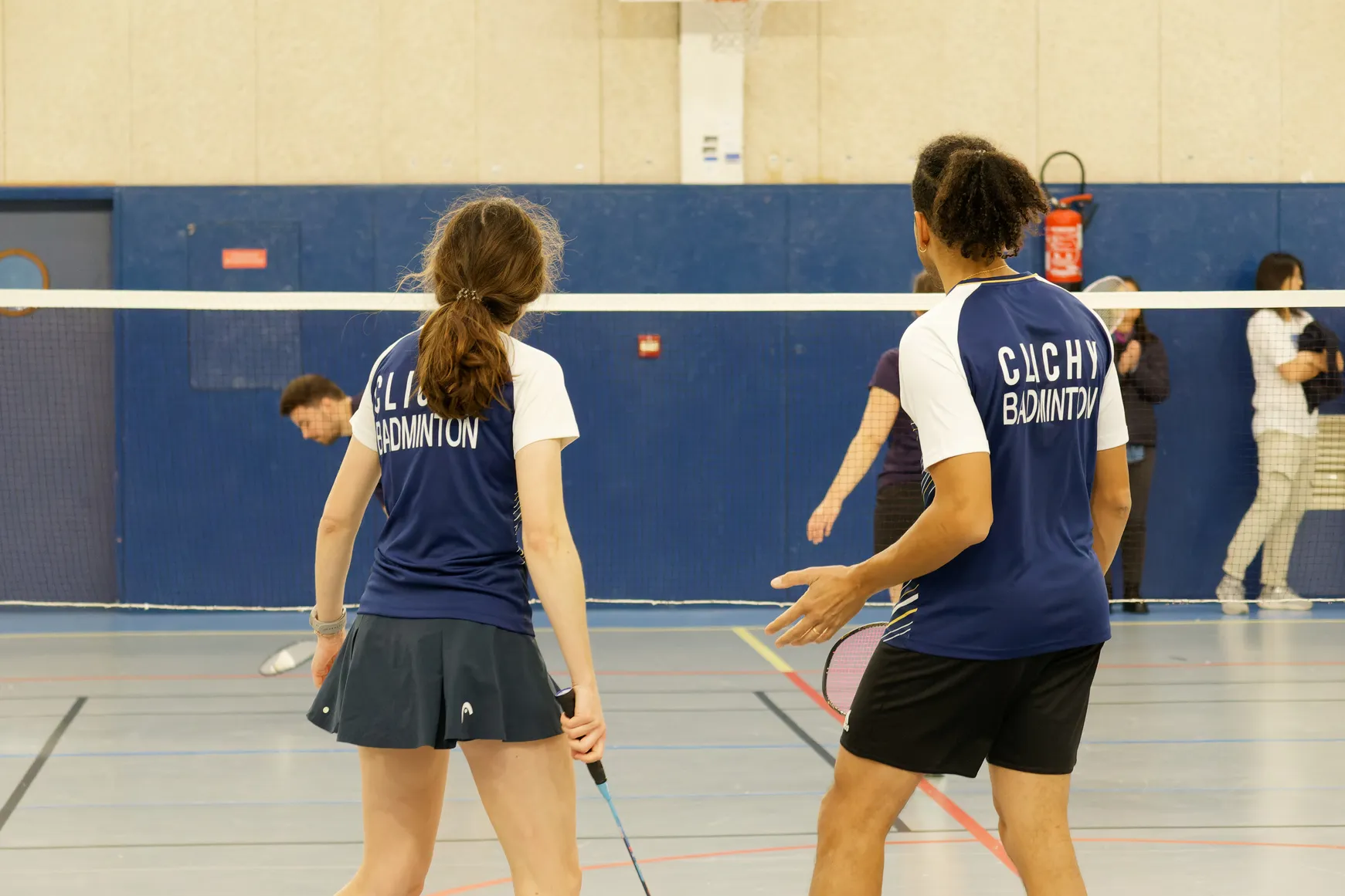 Un double mixte en cours de match